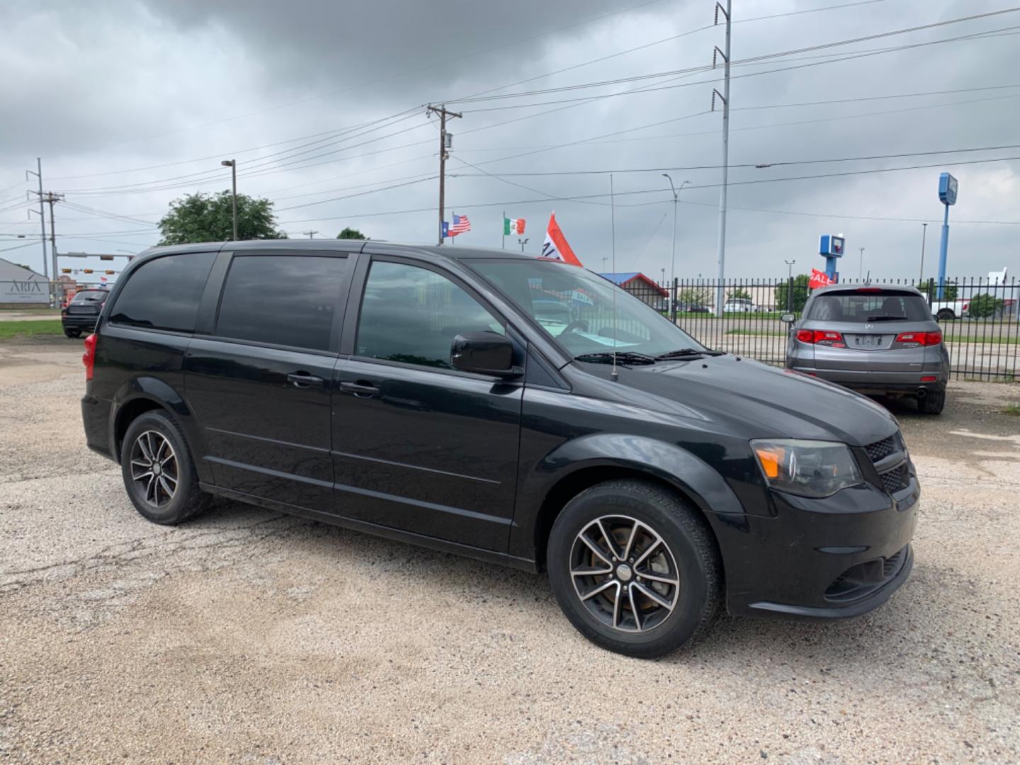 2015 Black /Black Dodge Grand Caravan SE (2C4RDGBG3FR) with an 3.6L V6 DOHC 24V engine, Automatic transmission, located at 1830 North Belt Line Road, Irving, TX, 75061, (469) 524-0199, 32.834373, -96.993584 - Photo#6